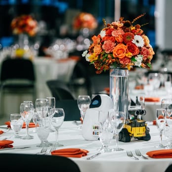 B&B Floral Design - Table arrangements for reception on 10/03/15. Mirtha suggested the water-filled vases with lights in the bottom to illuminate the tables. - Floral Designers Near Me B&B Floral Design - Table arrangements for reception on 10/03/15. Mirtha suggested the water-filled vases with lights in the bottom to illuminate the tables. - Floral Designers Near Me