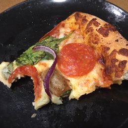 Lite pizza crust, pepperoni, sausage. Delicious.