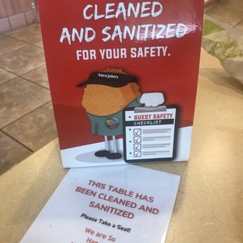 Taco John's - a table with a sign that says, your table has been cleaned and sanitize for your safety - Mexican Near Me - Deadwood, South Dakota Taco John's - a table with a sign that says, your table has been cleaned and sanitize for your safety - Mexican Near Me - Deadwood, South Dakota