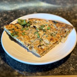 Dear Delhi Restaurant, Bar & Lounge - Onion stuffed naan.