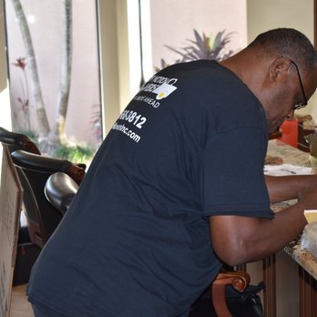 Top Notch Movers - Antony going thru the details of the estimate. - Movers Near Me - Boynton Beach, Florida Top Notch Movers - Antony going thru the details of the estimate. - Movers Near Me - Boynton Beach, Florida