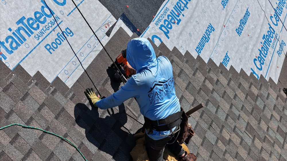 Slide of Candor Roofing Solutions