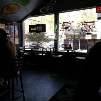 OTB Bicycle Café - View from inside liiking out onto Carson st. There is bike parking and seating out front - New American Near Me - Pittsburgh, Pennsylvania