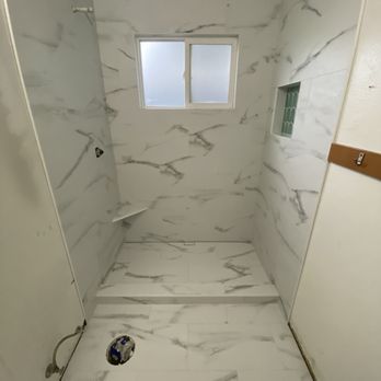 Quintessence Tile - a shower with a window - Flooring Near Me Quintessence Tile - a shower with a window - Flooring Near Me