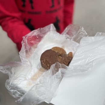 Kilwins - a person holding a box of cookies - Candy Stores Near Me - Bluffton, South Carolina Kilwins - a person holding a box of cookies - Candy Stores Near Me - Bluffton, South Carolina