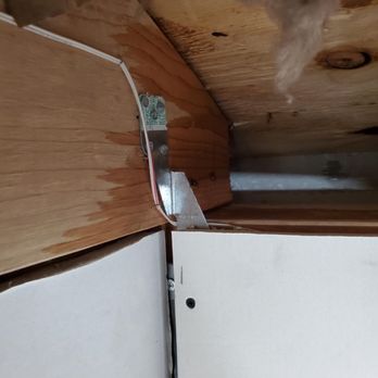 Chicagoland Garage Builders - Water coming through the roof from not using the correct water barrier on teh roof before putting the shingles on. - Garage Door Services Near Me - Melrose Park, Illinois