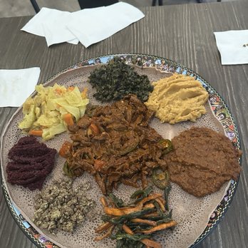 Ethiopis - Large Veggie Sampler and Awaze Tibs (in the center) - Ethiopian Near Me - Rockville, Maryland Ethiopis - Large Veggie Sampler and Awaze Tibs (in the center) - Ethiopian Near Me - Rockville, Maryland