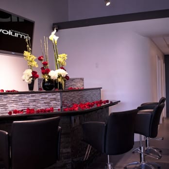 Volume Salons - Enjoy a movie & drink at our colour bar! - Hair Salons Near Me - Edmonton, Alberta