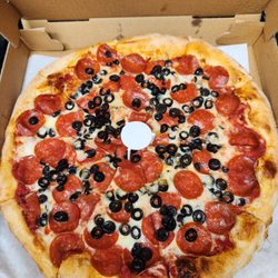 Large pizza with pepperoni and olives