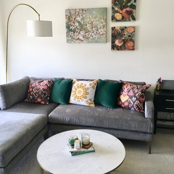 The Organizing Co. - Unwind after a busy day by curling up in your organized living room! - Home Organization Near Me