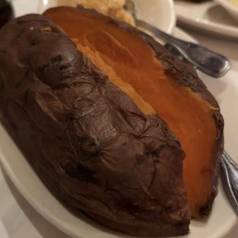 Gibsons Bar & Steakhouse - Gigantic sweet potato - Steakhouses Near Me - Rosemont, Illinois Gibsons Bar & Steakhouse - Gigantic sweet potato - Steakhouses Near Me - Rosemont, Illinois