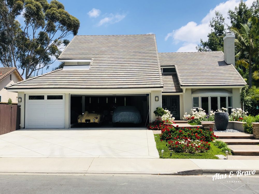 Slide of Alas & Bravo Roofing Company