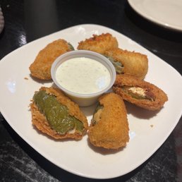 Hand breaded cream cheese jalapeño poppers Hand breaded cream cheese jalapeño poppers