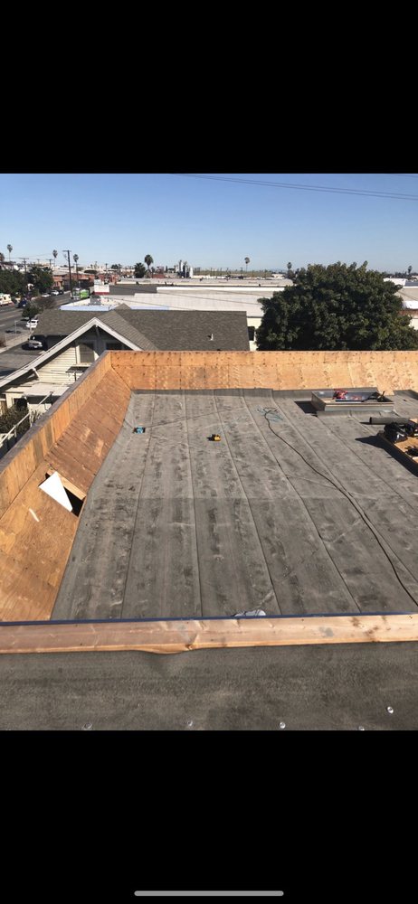 Slide of J.P Roofing Enterprise