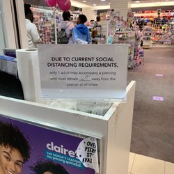 Claire's Boutique - Store Piercing Policy (clerk in question behind the counter)