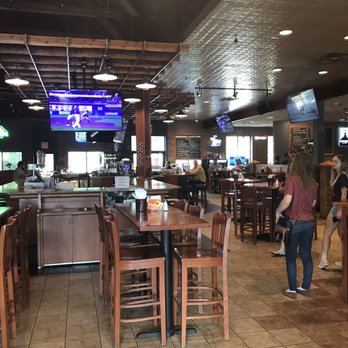 Cuzzy's Brick House - people in a restaurant - New American Near Me - Chaska, Minnesota