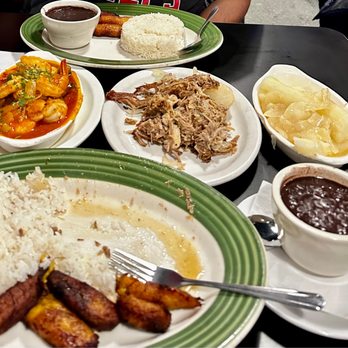 Romeito Cuban Restaurant - Roasted pork, shrimp and fish and creole sauce, steamed yuca, and sides. - Cuban Near Me - Olathe, Kansas Romeito Cuban Restaurant - Roasted pork, shrimp and fish and creole sauce, steamed yuca, and sides. - Cuban Near Me - Olathe, Kansas