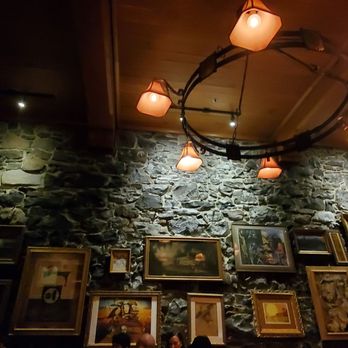 Gilded Unicorn - Brick walls with artwork - Cocktail Bars Near Me - Spokane, Washington