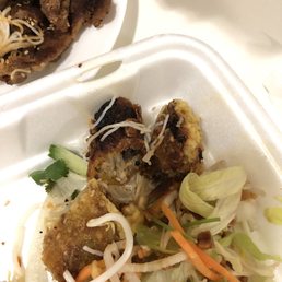 What the hell is this burnt ( overcooked) not deep fried spring roll? What the hell is this burnt ( overcooked) not deep fried spring roll?