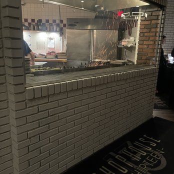 ChopHouse Thirteen - Viewing area for steak preparation - Bars Near Me - Jacksonville, Florida ChopHouse Thirteen - Viewing area for steak preparation - Bars Near Me - Jacksonville, Florida