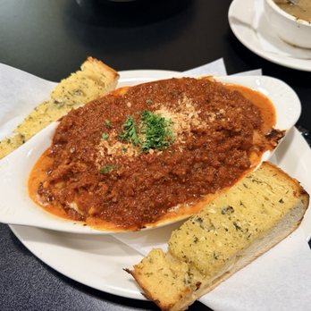Art's Place - Lasagna, buried in meat sauce made - New American Near Me - Rohnert Park, California