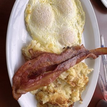 Brothers Egg House - 3 eggs over easy, bacon, Hashbrowns and toast on the side - Breakfast & Brunch Near Me - Houston, Texas