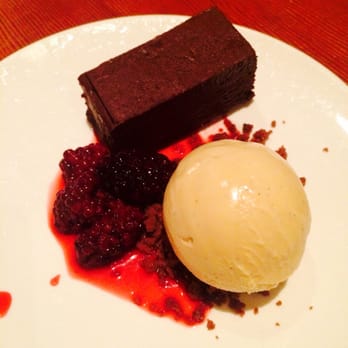 Staple & Fancy - Chocolate cake with coconut ice-cream and berries - Italian Near Me - Seattle, Washington