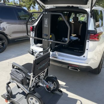 United Access - My electric wheelchair positioned to be automatically placed in the car's cargo area. - Mobility Equipment Sales & Services Near Me - San Bernardino, California United Access - My electric wheelchair positioned to be automatically placed in the car's cargo area. - Mobility Equipment Sales & Services Near Me - San Bernardino, California
