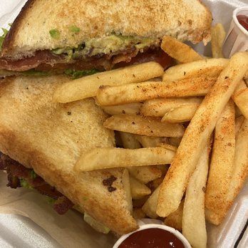 City Cafe - a sandwich and fries in a styrofoam container - Food Court Near Me - Houston, Texas