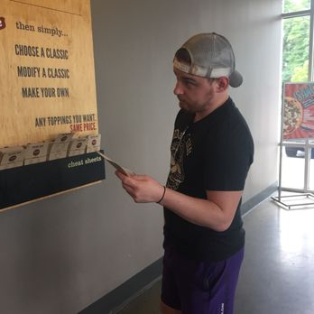 MOD Pizza - My boyfriend, studying the menu. - Pizza Near Me - Willow Grove, Pennsylvania MOD Pizza - My boyfriend, studying the menu. - Pizza Near Me - Willow Grove, Pennsylvania