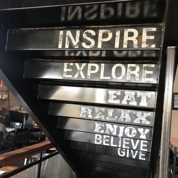 Woods Coffee - a staircase with a sign that says inspire explore eat and enjoy believe believe - Coffee & Tea Near Me - Bellingham, Washington Woods Coffee - a staircase with a sign that says inspire explore eat and enjoy believe believe - Coffee & Tea Near Me - Bellingham, Washington