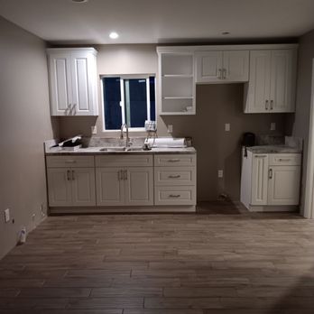 White Oak Construction  - Kitchen cabinets and tile flooring - General Contractors Near Me