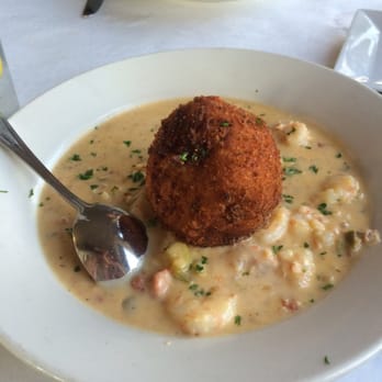 Fisherman's Corner - Shrimp and grits. Lots of shrimp! With a giant fried ball of goodness - Cajun/Creole Near Me - Pensacola, Florida