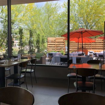 The Gladly - View from interior to outdoor patio - New American Near Me - Phoenix, Arizona The Gladly - View from interior to outdoor patio - New American Near Me - Phoenix, Arizona