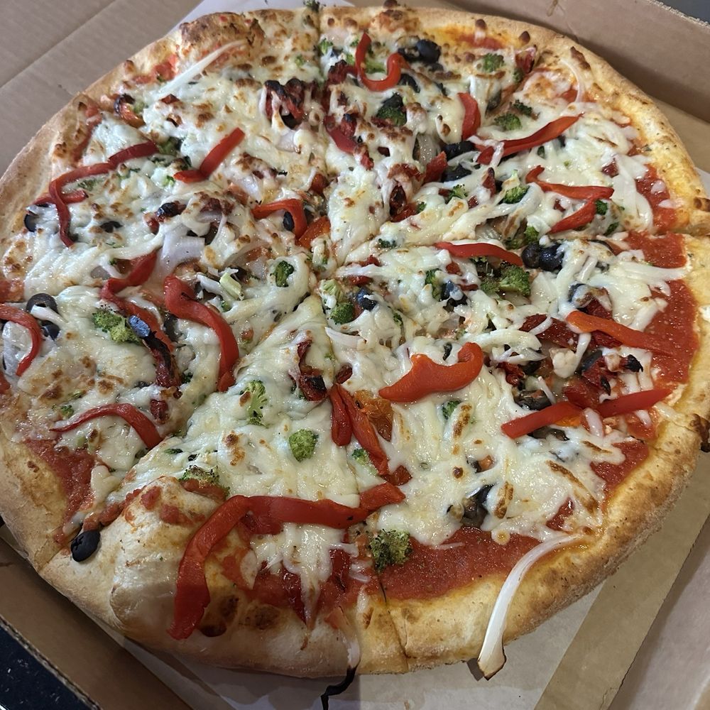 Veggie pizza (definitely undercooked) Veggie pizza (definitely undercooked)