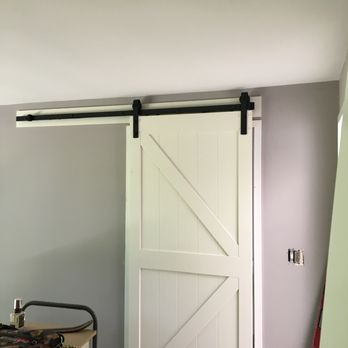 VHR Family Construction - a white barn door - General Contractors Near Me VHR Family Construction - a white barn door - General Contractors Near Me