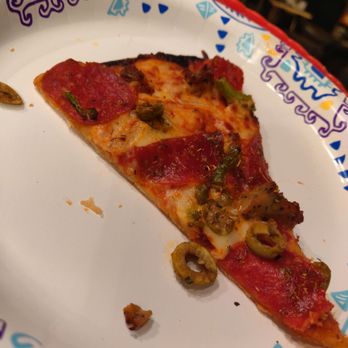 Dominos Pizza - a slice of pizza on a paper plate - Pizza Near Me - Grand Blanc, Michigan