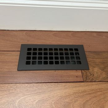 Taozen Floors Services - Refinished bedroom floor with metal register - Flooring Near Me - Waltham, Massachusetts