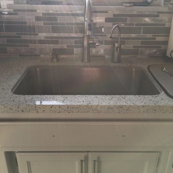 Elite Stone Group - Single sink, quart & glass stone back splash - Building Supplies Near Me - Montebello, California