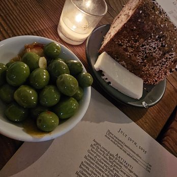 Pizzaiolo - House Marinaded olives and Acme bread - Italian Near Me - Oakland, California Pizzaiolo - House Marinaded olives and Acme bread - Italian Near Me - Oakland, California