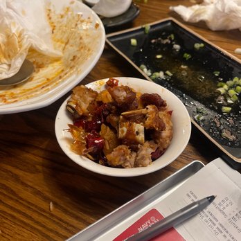 Duck n Bao - Amount of pork bones, peppers I had to take out of my food. - Szechuan Near Me - Cypress, Texas Duck n Bao - Amount of pork bones, peppers I had to take out of my food. - Szechuan Near Me - Cypress, Texas