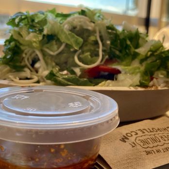 Chipotle Mexican Grill - half white rice, half brown, half pinto beans, half black, carnitas, lettuce, sour cream, cheese, guac, and the new red chimichurri sauce - Mexican Near Me - Plano, Texas