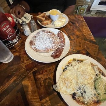 Tout De Suite Cafe - Two Egg breakfast with grits, Banana Pancake, and The Katrita (Huevos Rancheros). - Coffee & Tea Near Me - New Orleans, Louisiana Tout De Suite Cafe - Two Egg breakfast with grits, Banana Pancake, and The Katrita (Huevos Rancheros). - Coffee & Tea Near Me - New Orleans, Louisiana