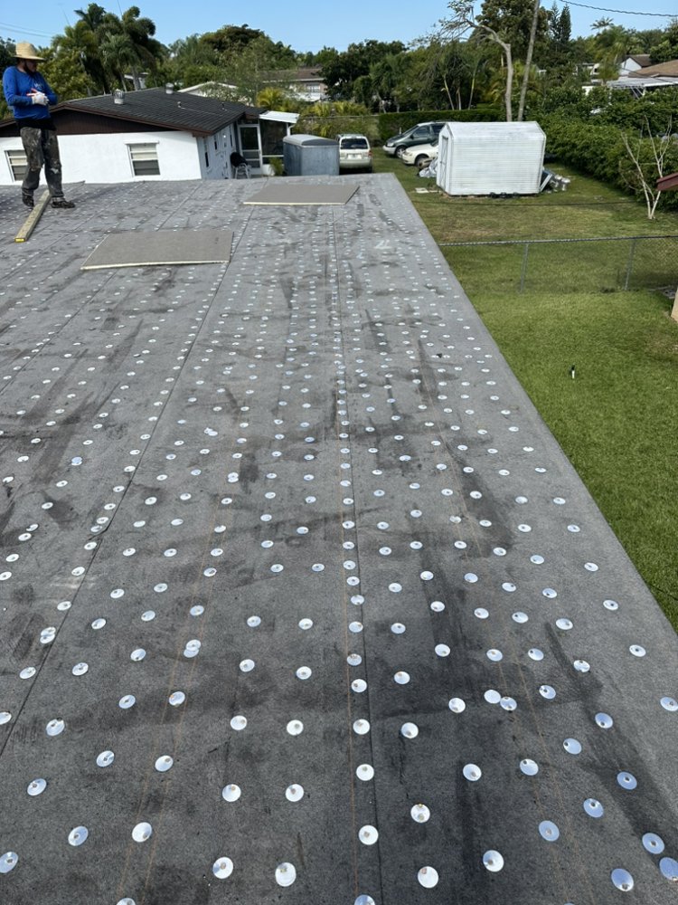 Slide of MC Roofing Service