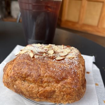 Whisk - Chocolate almond croissant with cold brew-aka: the best combo - Bakeries Near Me - Richmond, Virginia Whisk - Chocolate almond croissant with cold brew-aka: the best combo - Bakeries Near Me - Richmond, Virginia