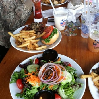 Seacrets - House salad and DE Burger - Bars Near Me - Ocean City, Maryland Seacrets - House salad and DE Burger - Bars Near Me - Ocean City, Maryland