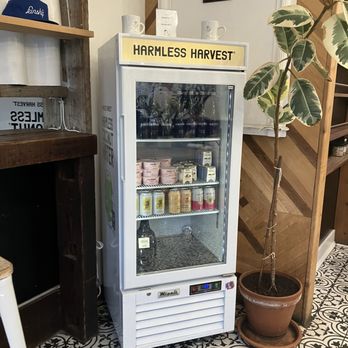 Kinship Coffee - a small refrigerator with drinks in it - Coffee & Tea Near Me - Astoria, New York Kinship Coffee - a small refrigerator with drinks in it - Coffee & Tea Near Me - Astoria, New York