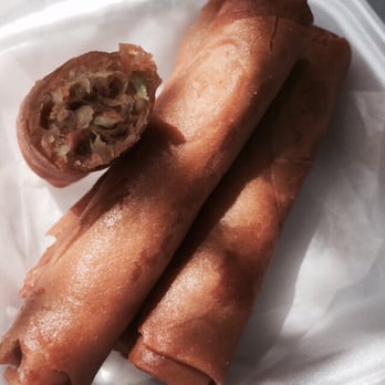 Eggroll Lady & Fish Shack - Order of five egg rolls with a peak inside. - Vietnamese Near Me - Worcester, Massachusetts