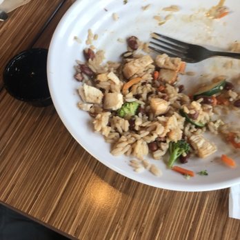 Rumbi - a plate of food left on a table - Caribbean Near Me - Logan, Utah