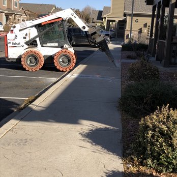 FR Companies - a construction vehicle on a sidewalk - Real Estate Services Near Me - Fort Collins, Colorado